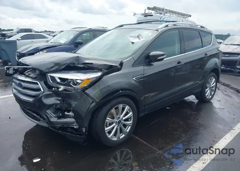 2017 Ford Escape Titanium z USA, uszkodzony, nr VIN 1FMCU0J97HUD24223